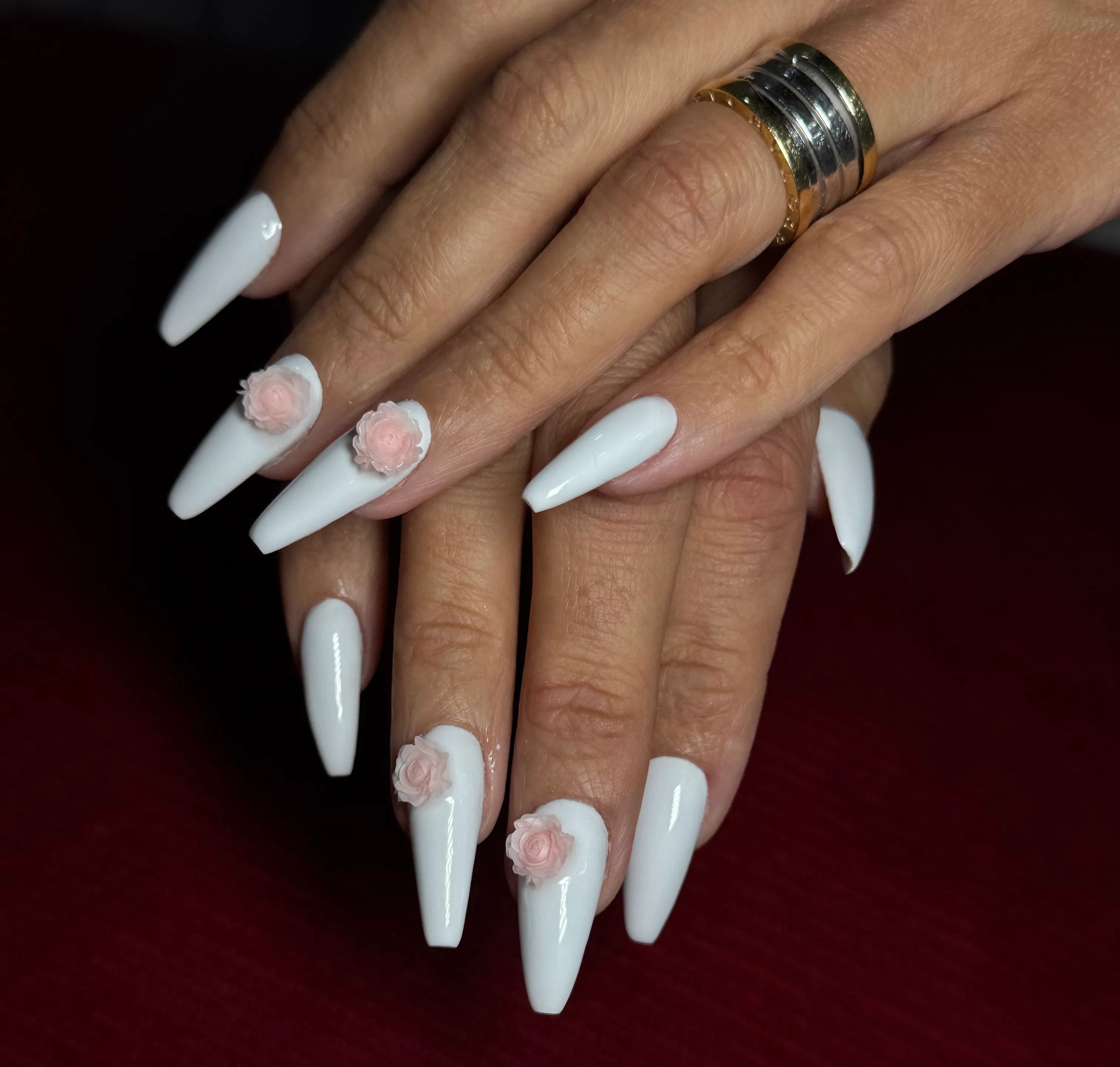 White ballerina nails with 3D rose design