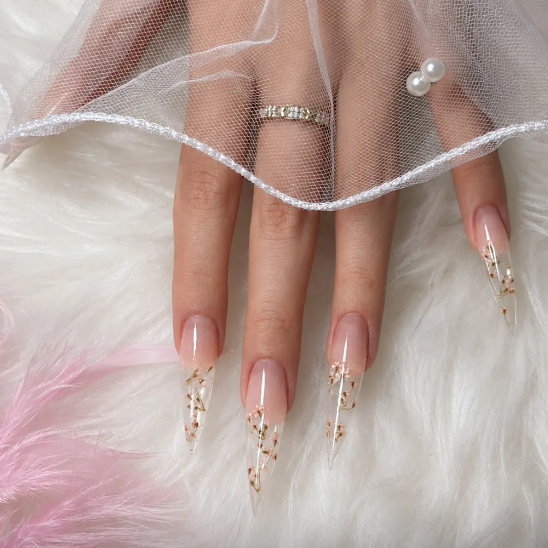 Stiletto nail extensions with floral design