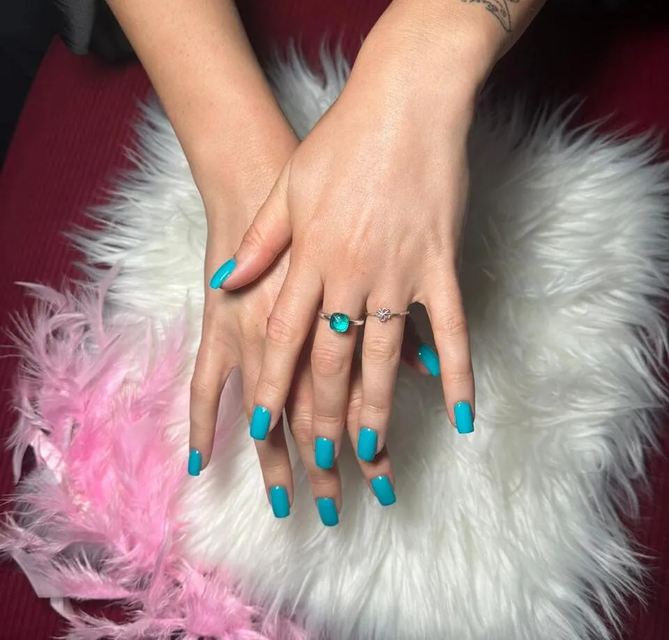 Bright turquoise gel manicure